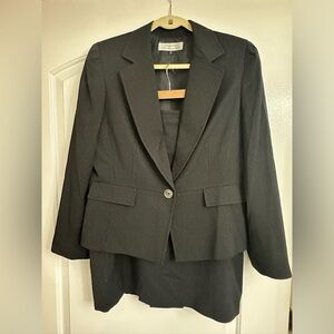 Tahari: 2 piece suit: Black pin stripe. Tahari skirt suit